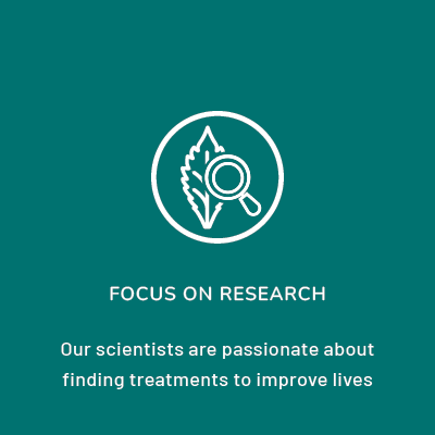 Within the circle is a sketch of a leaf with a magnifying glass. Beneath the circle the words read: Focus on research. Our scientists are passionate about finding treatments to improve lives.