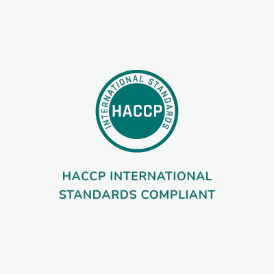 A teal emblem with the text 'INTERNATIONAL STANDARDS' and 'HACCP' in the center. Below it, the text reads 'HACCP INTERNATIONAL STANDARDS COMPLIANT.' Linnea, a company that manufactures pharmaceutical ingredients, specializes in CBD, bulk cannabinoids, and cannabinoid solutions.