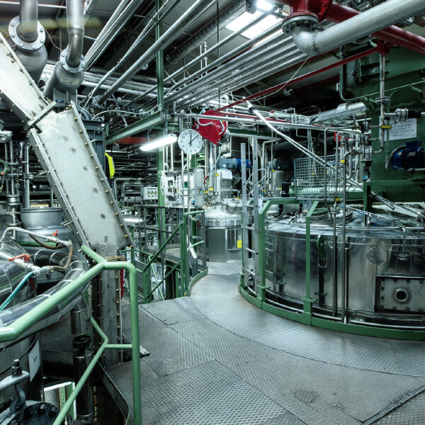 The production facility at Linnea, a renowned tetrahydrocannabidinol extract manufacturer, is equipped with advanced machinery and infrastructure. Linnea specializes in producing pharmaceutical-grade cannabigerol isolate, ensuring high-quality and precise extraction processes. The image highlights the complexity and scale of operations involved in manufacturing their premium botanical extracts.